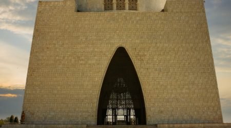 travel guide | destination | karachi | KHI | pakistan | Sunsets Warm Glow at the Mausoleum of MazareQuaid; Karachi; Pakistan-AdobeStock_772434422